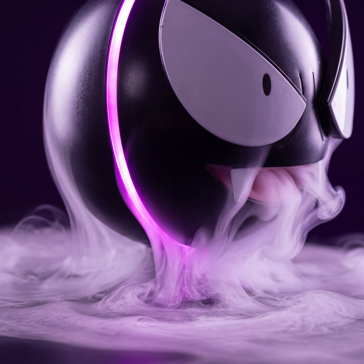 Close-up of the Ghost Orb mist lamp surface and violet glow